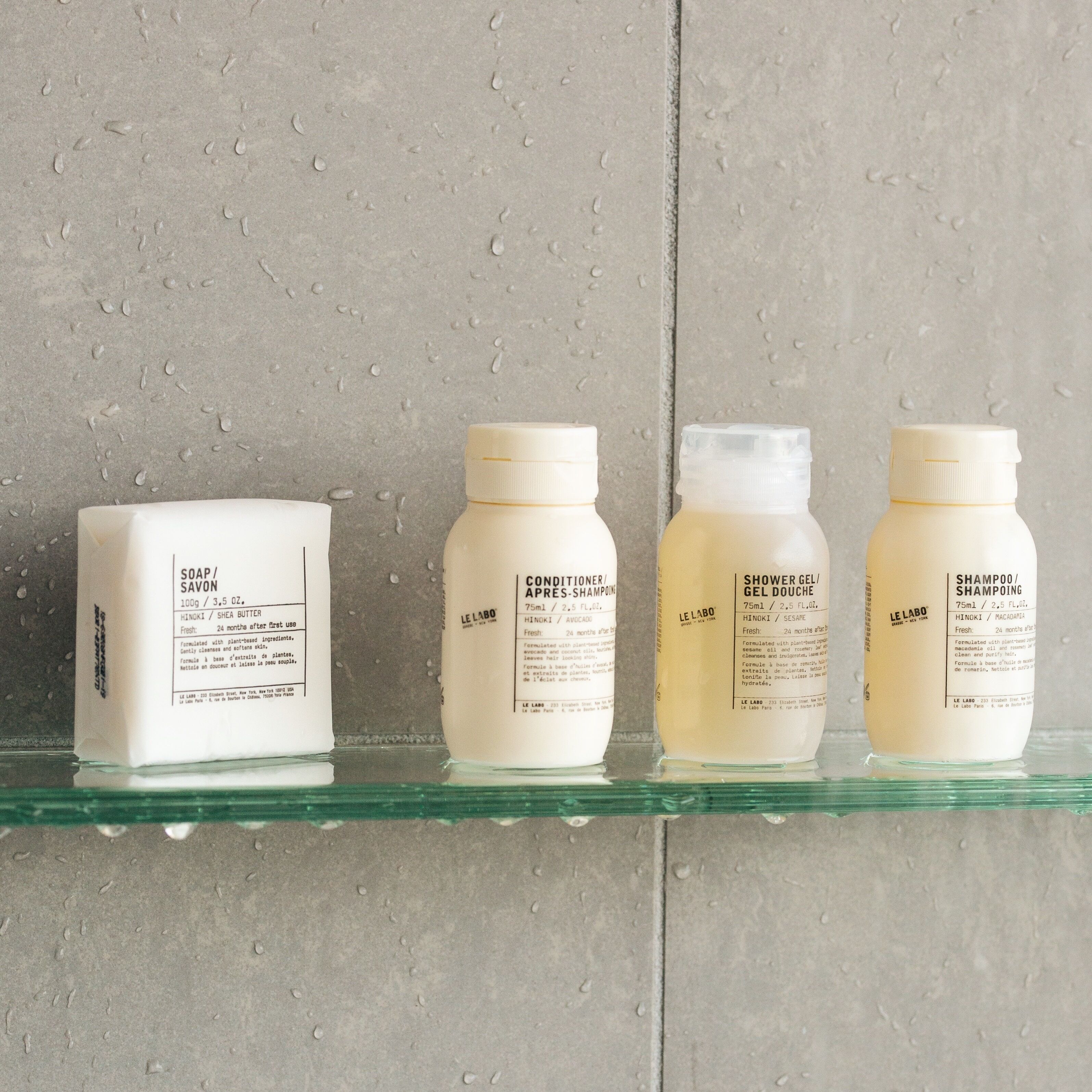 designer toiletries, hair dryer, bathrobes, towels