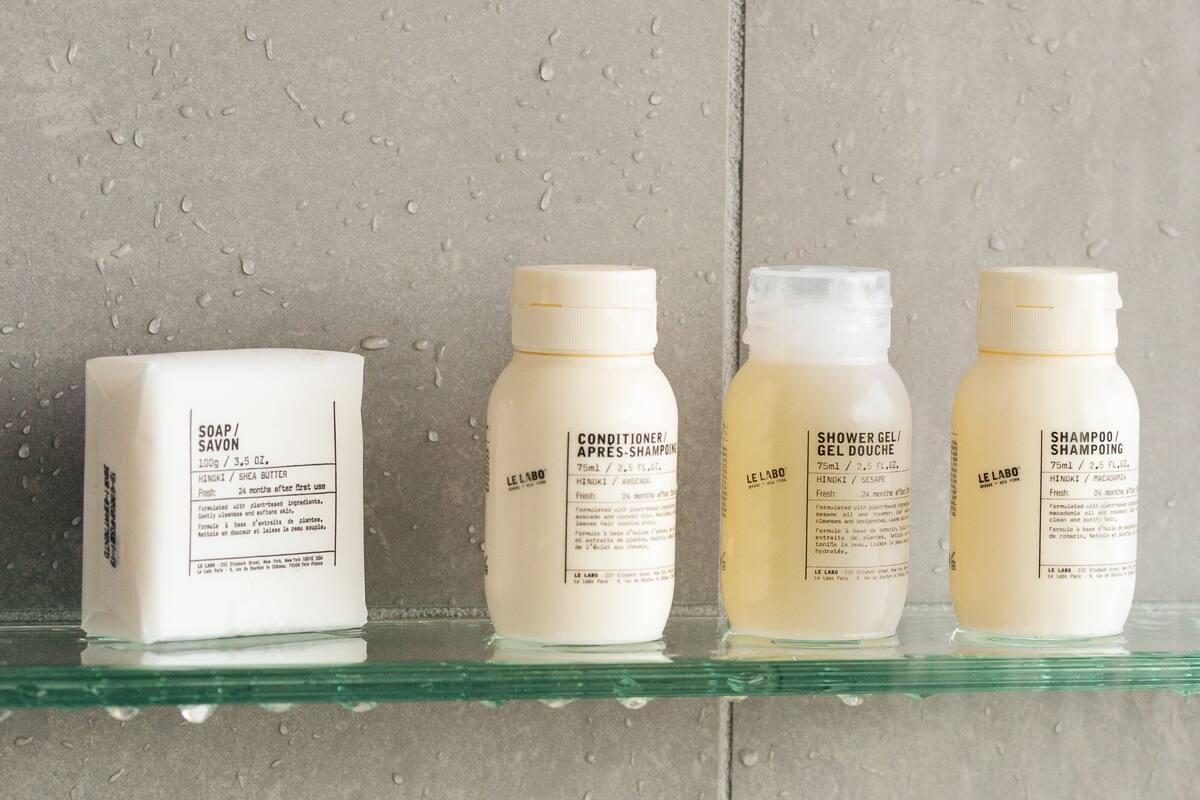 designer toiletries, hair dryer, bathrobes, towels