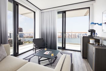 Suite, 1 Queen Bed, Balcony, Corner (Gotham) | Living area | 48-inch flat-screen TV with cable channels, TV, pay movies at The William Vale