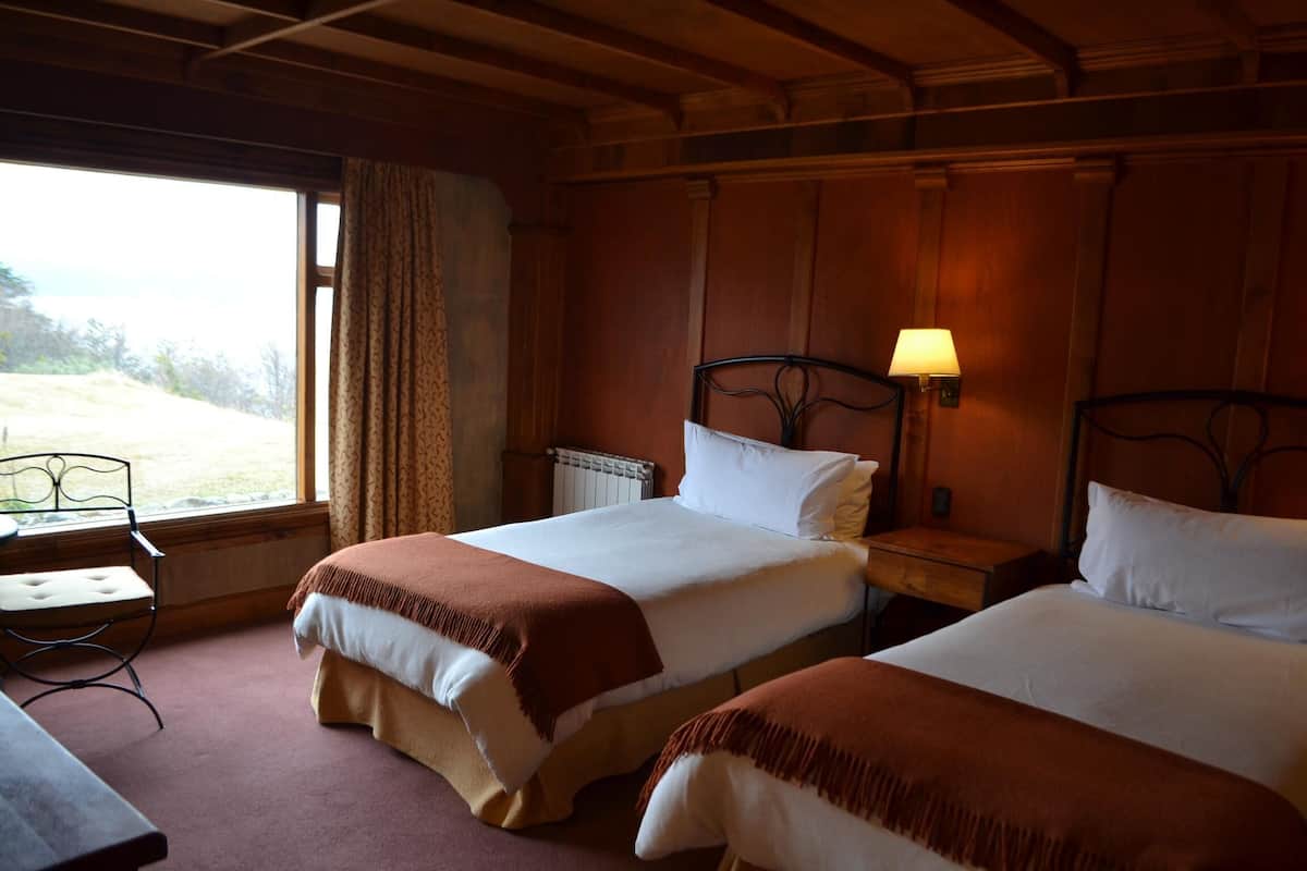 Luxe beddengoed, een minibar, een kluis op de kamer, een bureau