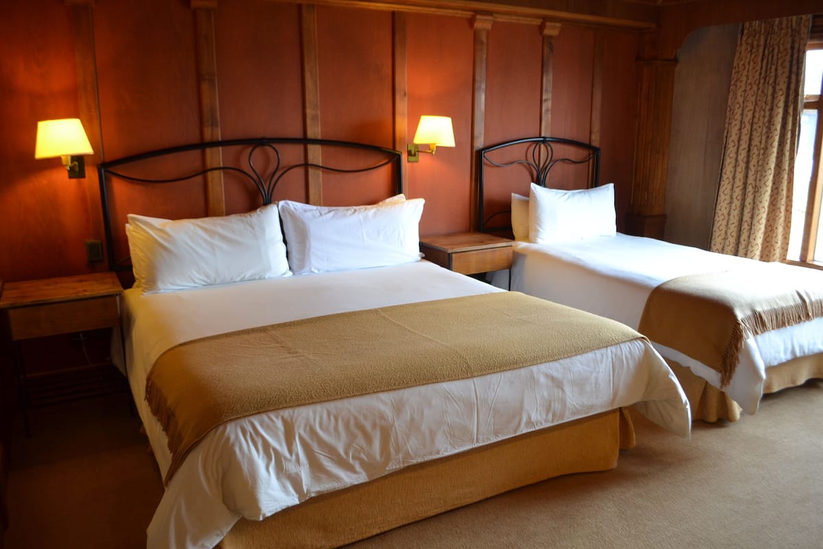 Luxe beddengoed, een minibar, een kluis op de kamer, een bureau