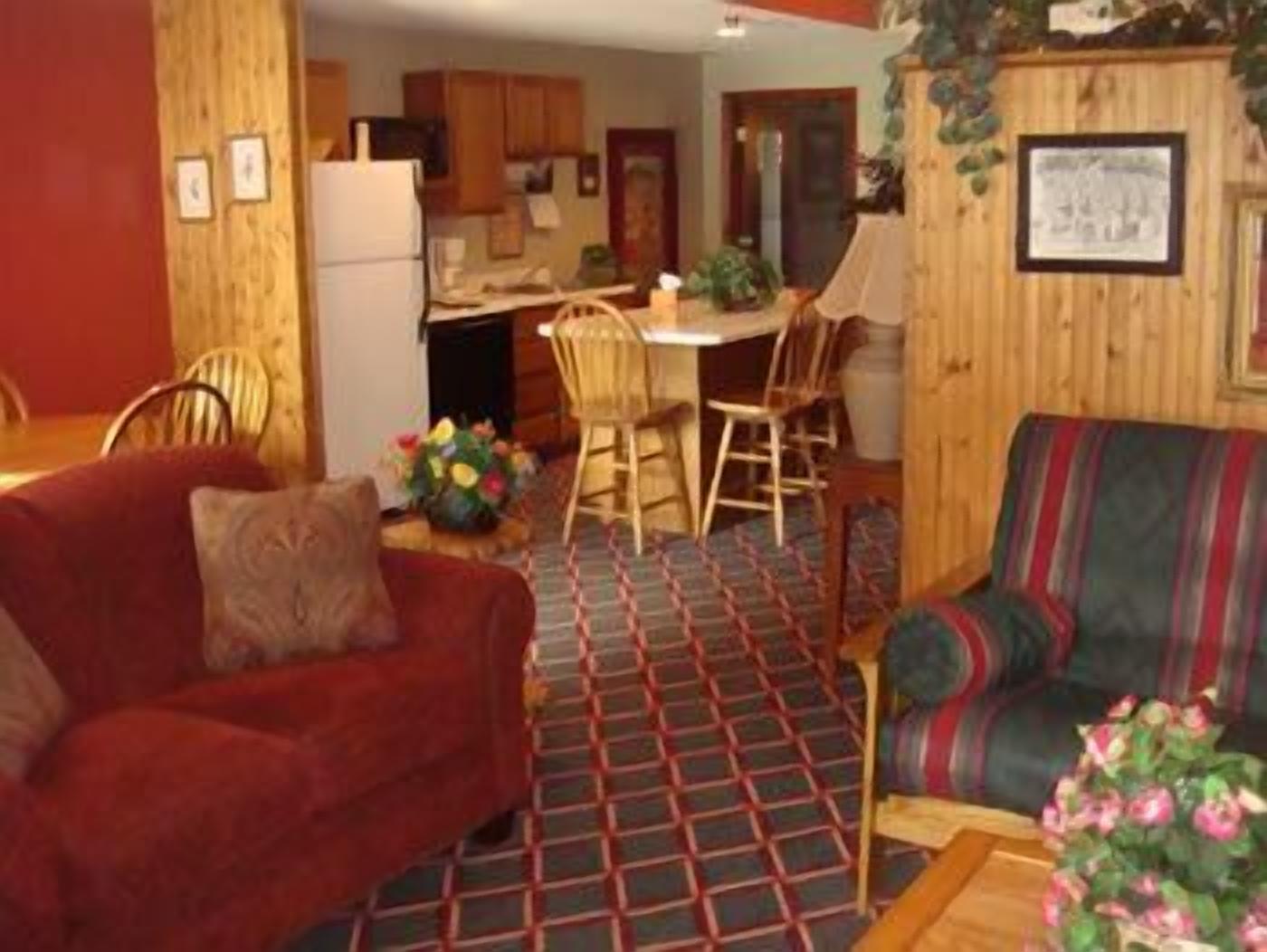 Luxury Suite | Living area | Flat-screen TV