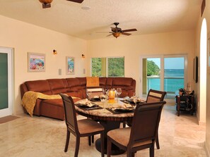 Deluxe Suite, 2 Bedrooms | Living area | 42-inch flat-screen TV with satellite channels, TV, DVD player