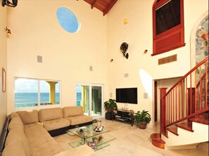 Deluxe Suite, 3 Bedrooms | Living room | 42-inch flat-screen TV with satellite channels, TV, DVD player - Sea Shore Allure (St. John)