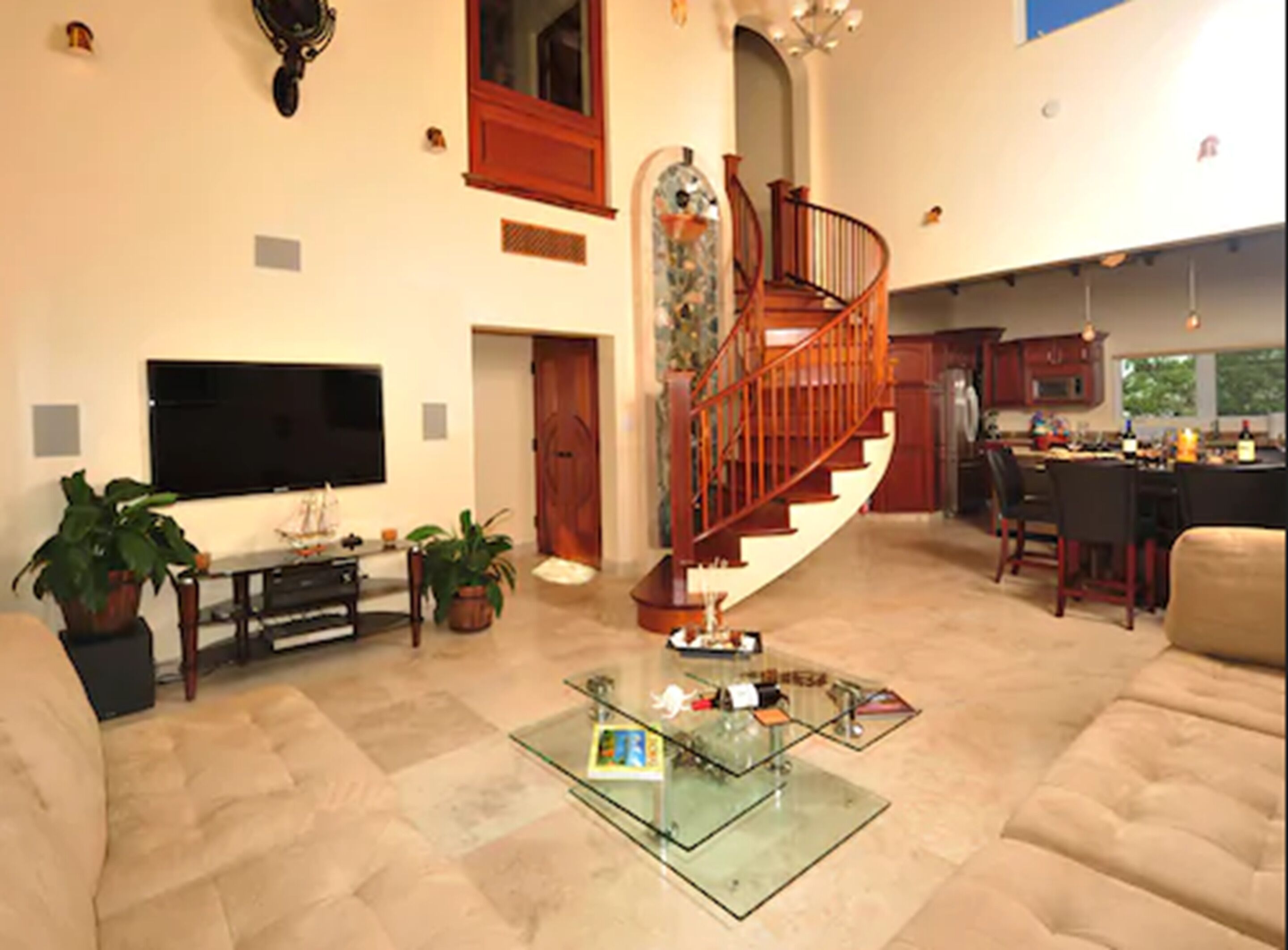 deluxe suite, 3 bedrooms | living area | 42-inch flat-screen tv with satellite channels, tv, dvd player