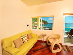 Suite, 1 Bedroom | Living area | 42-inch flat-screen TV with satellite channels, TV, DVD player - Sea Shore Allure (St. John)