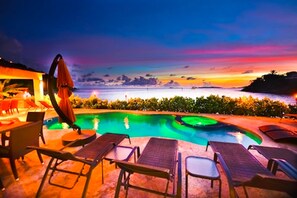Outdoor pool, pool umbrellas, sun loungers