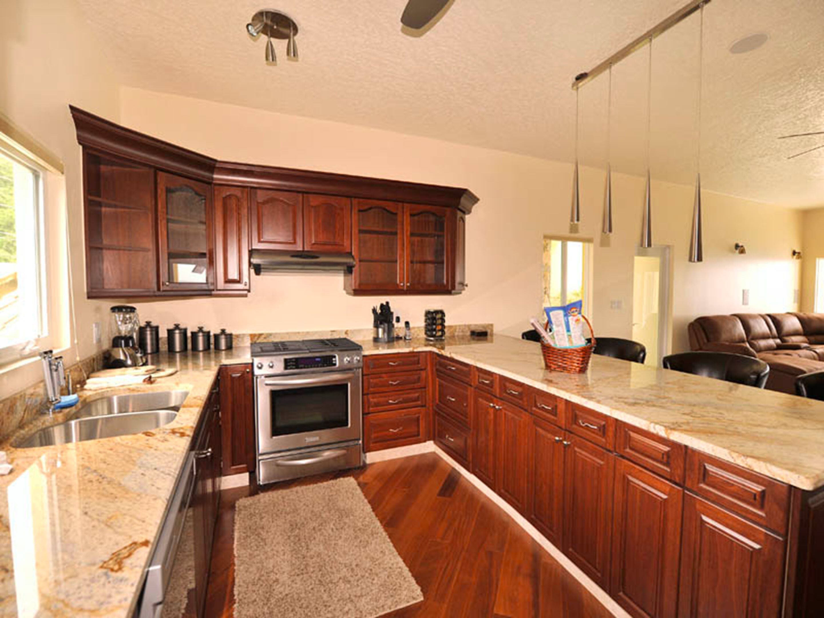deluxe suite, 2 bedrooms | private kitchen | full-sized fridge, microwave, stovetop, dishwasher