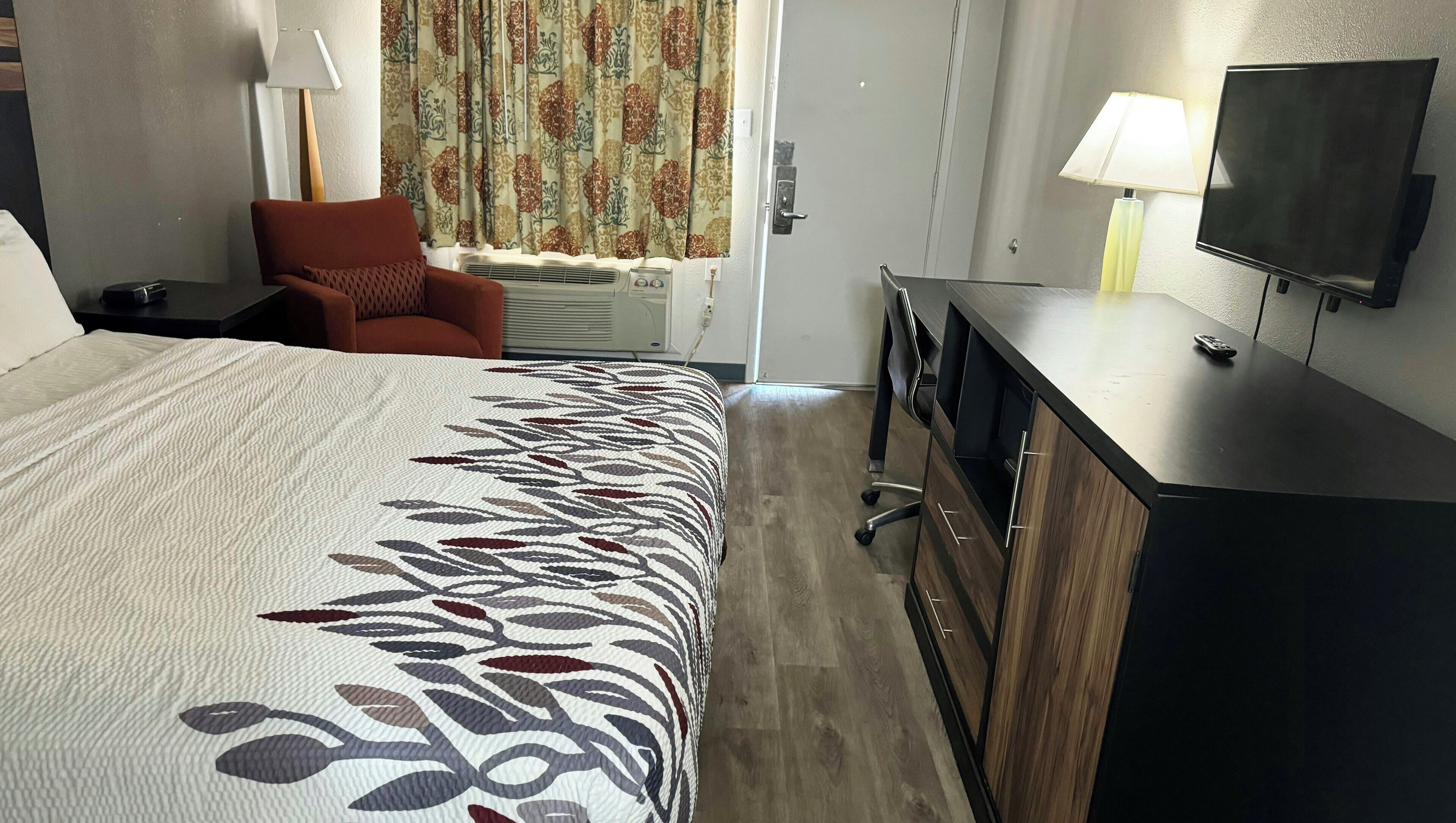 Room, 1 King Bed, Non Smoking, Refrigerator & Microwave | Desk, laptop workspace, blackout drapes, iron/ironing board