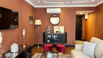 Royal Suite, 1 King Bed | Living area | 20-inch LCD TV with satellite channels, TV