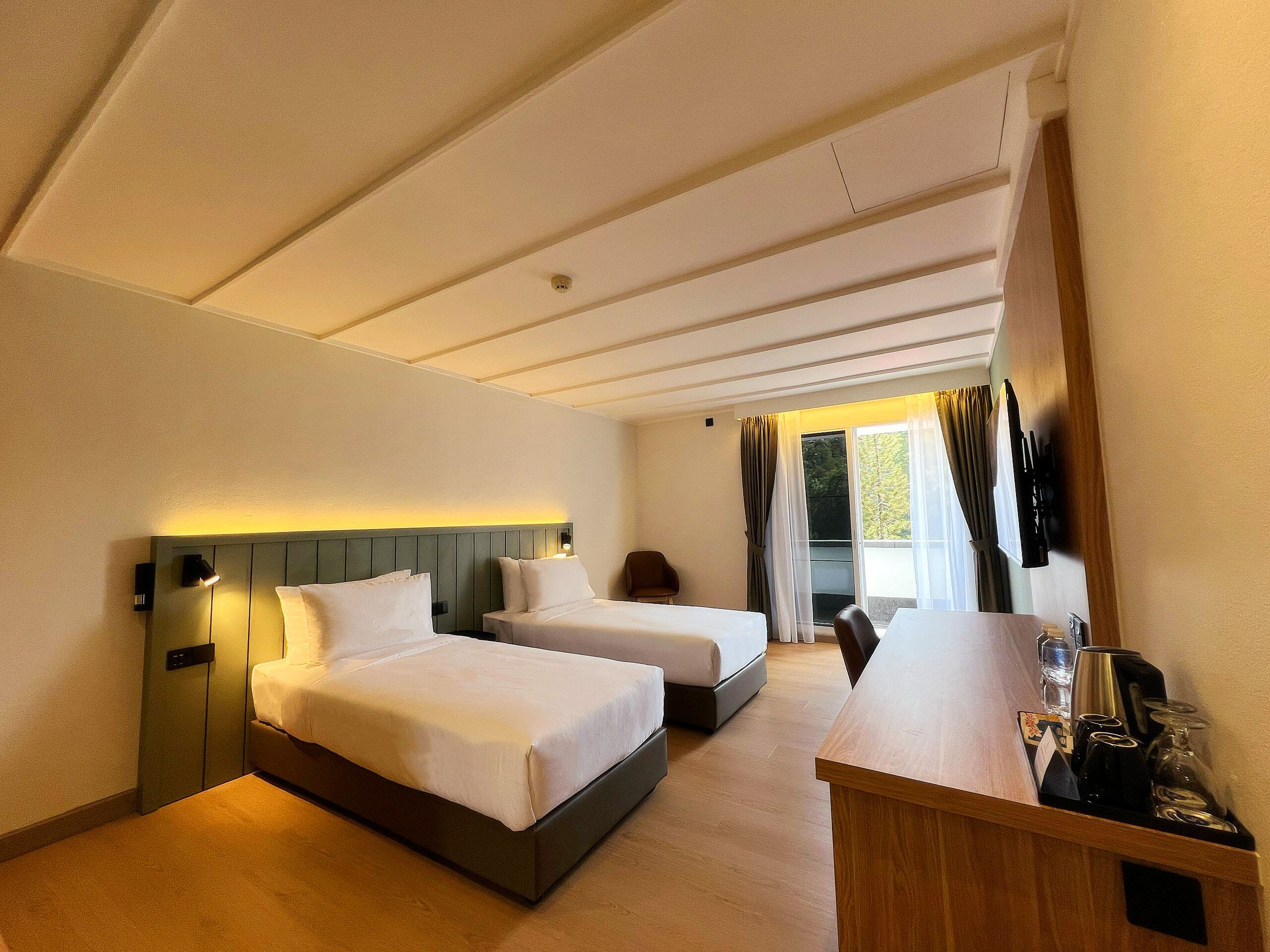 尊荣单人房, 2 张单人床 | 客房内保险箱、床单、轮椅无障碍