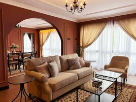 Royal Suite, 1 King Bed | Living area | 20-inch LCD TV with satellite channels, TV