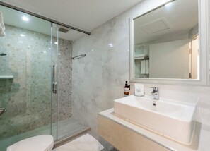 Hair dryer, slippers, towels, soap