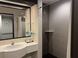 Shower, free toiletries, hair dryer, towels
