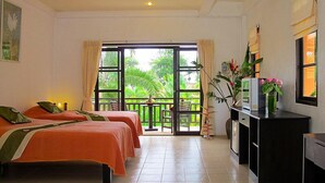 A hotel room with two beds, a desk, and a view of the outdoors. - Khaolak Palm Hill Resort (Takua Pa)