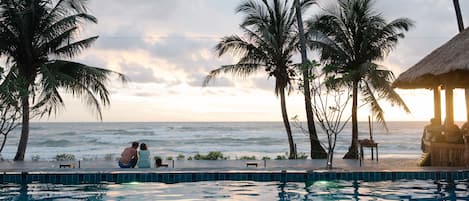 Outdoor pool, pool umbrellas, sun loungers