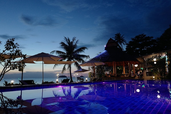 Outdoor pool, pool umbrellas, sun loungers