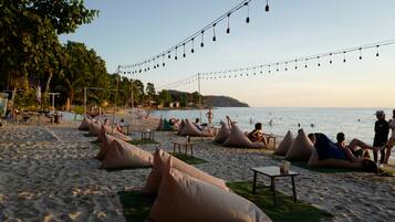 On the beach, beach towels