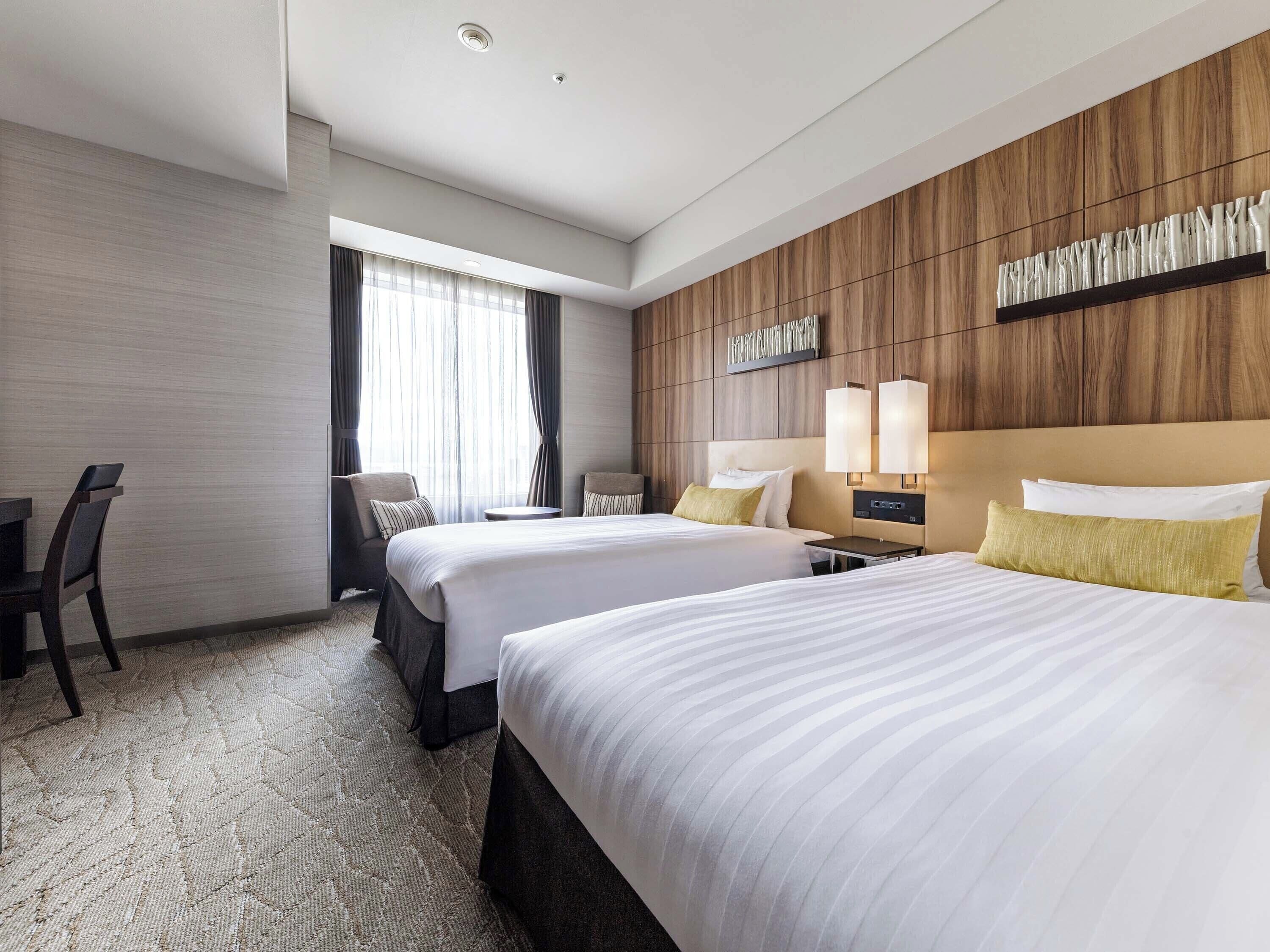 Habitación superior con 2 camas individuales, para no fumadores | Ropa de cama de alta calidad y caja de seguridad en la habitación 