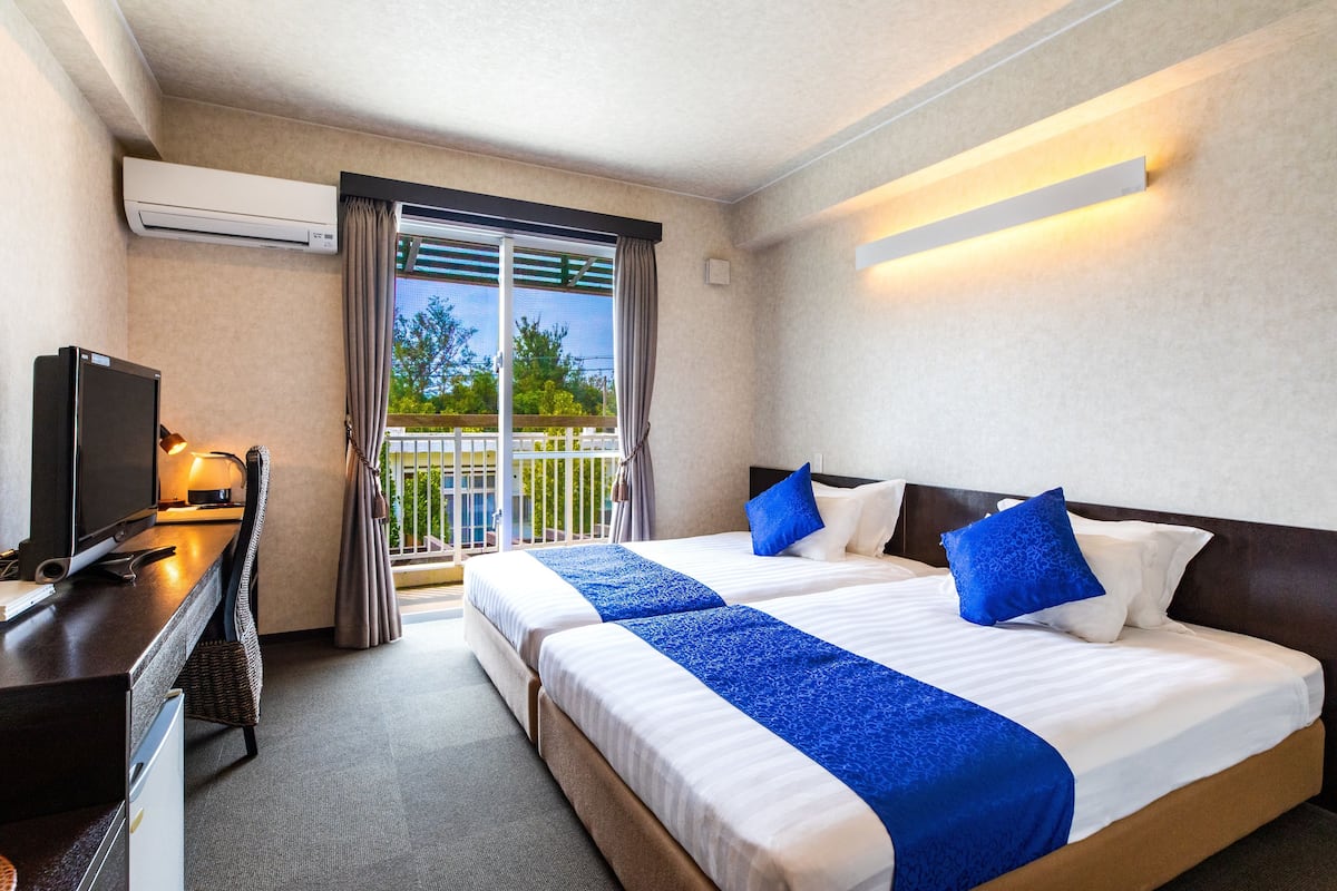 Standaard Twin kamer, 1 slaapkamer, niet-roken, balkon | Een kluis op de kamer, geluiddichte muren, gratis wifi, beddengoed