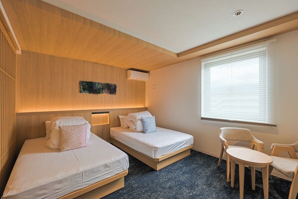 Twin Room | Blackout drapes, bed sheets