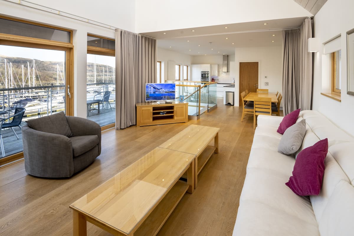 townhouse luxury apartment | living area | flat-screen tv
