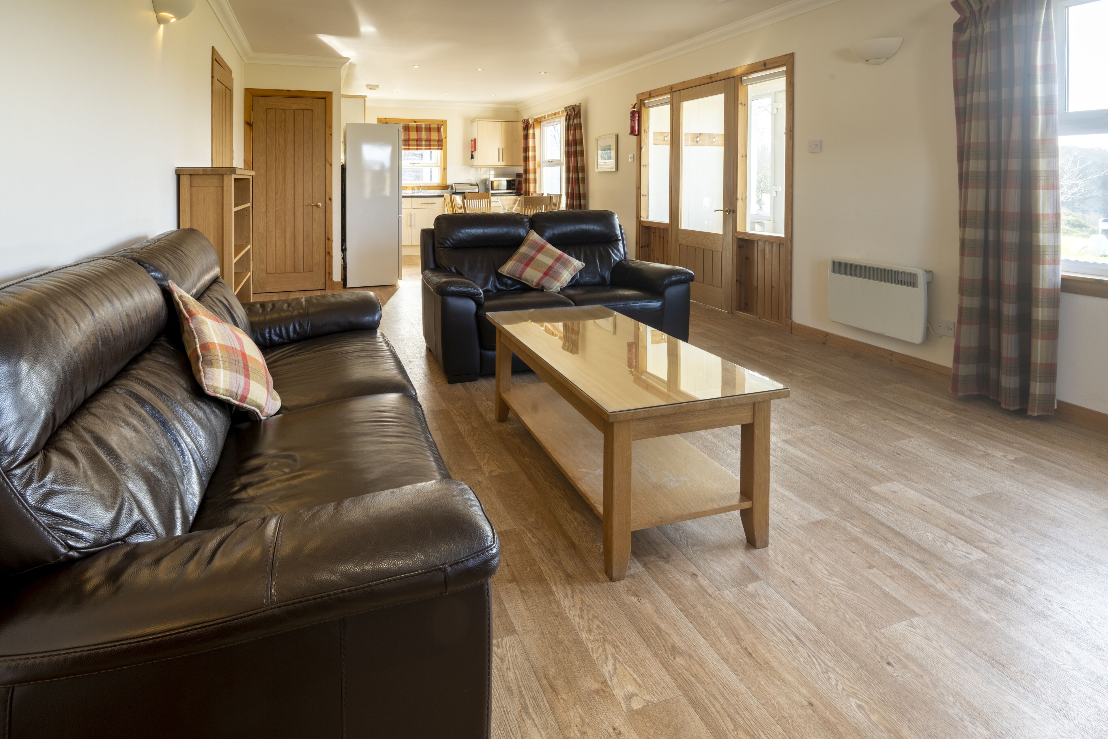 two bedroom cottage (pet friendly) | living area | flat-screen tv