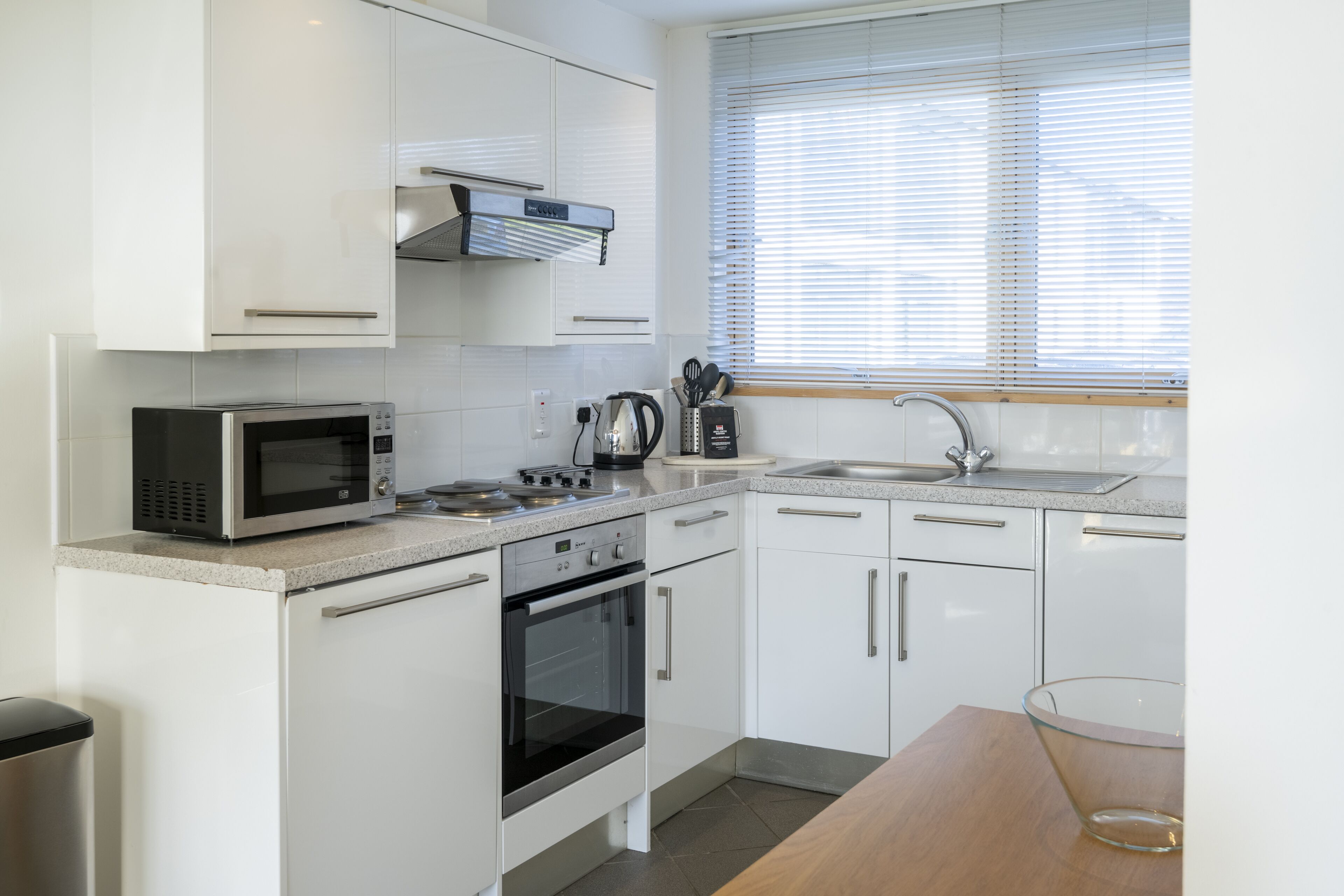 studio apartment (pet friendly) | private kitchen | electric kettle, toaster, dining tables