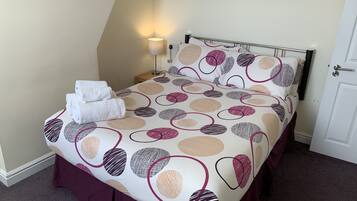 Family Suite, 2 Bedrooms | Desk, iron/ironing board, free WiFi, bed sheets