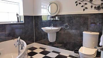 Honeymoon Double Room | Bathroom | Rainfall showerhead, free toiletries, hair dryer, towels