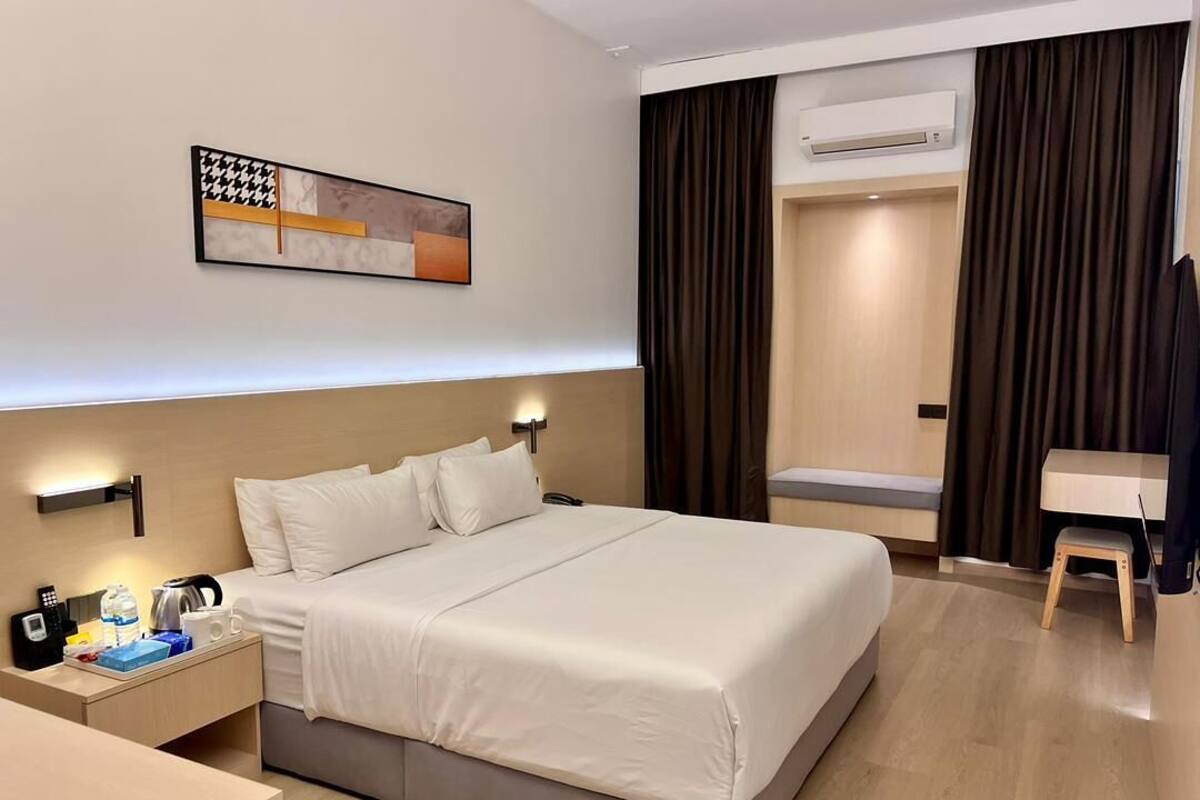 Quarto premium | Frigobar, cofres nos quartos, escrivaninha