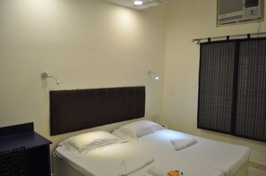 Standard Room, Multiple Bedrooms | Desk, iron/ironing board, rollaway beds, free WiFi