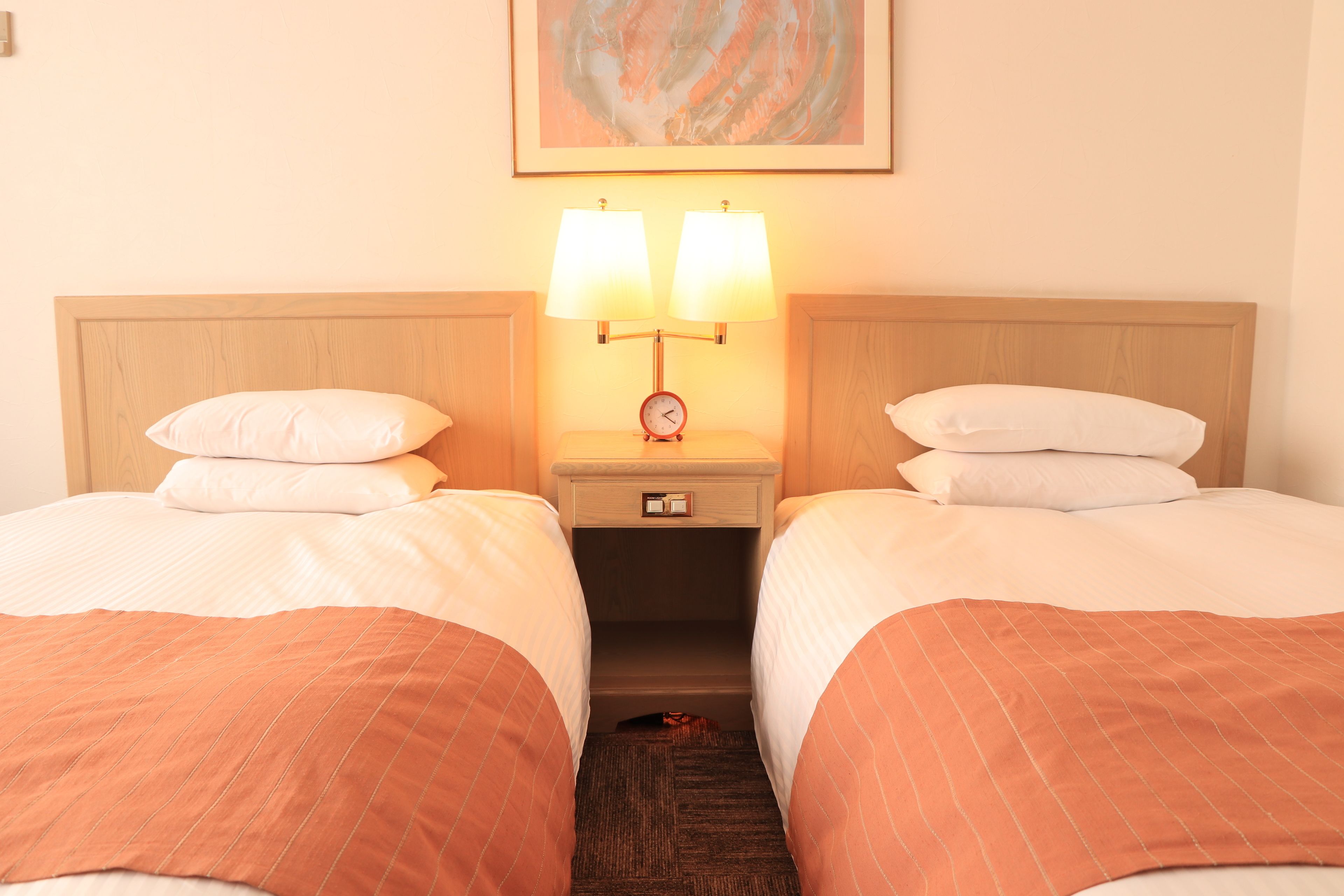 deluxe twin room | 1 bedroom, in-room safe, desk, iron/ironing board