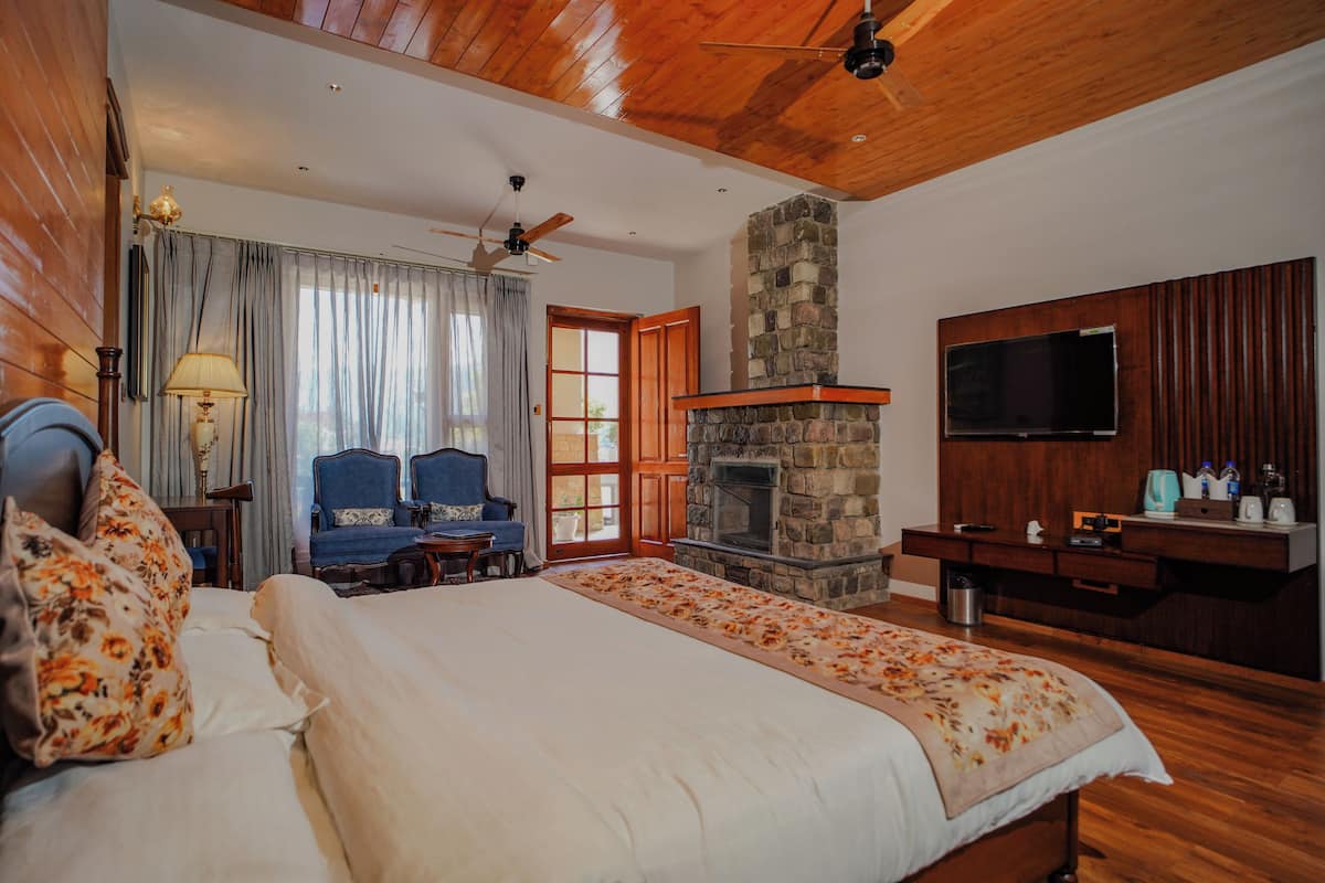 Habitación Premium, vista al jardín (Ground Floor) | Ropa de cama de alta calidad y escritorio