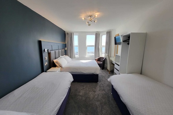 Family Room, Sea View | Iron/ironing board, free WiFi, bed sheets