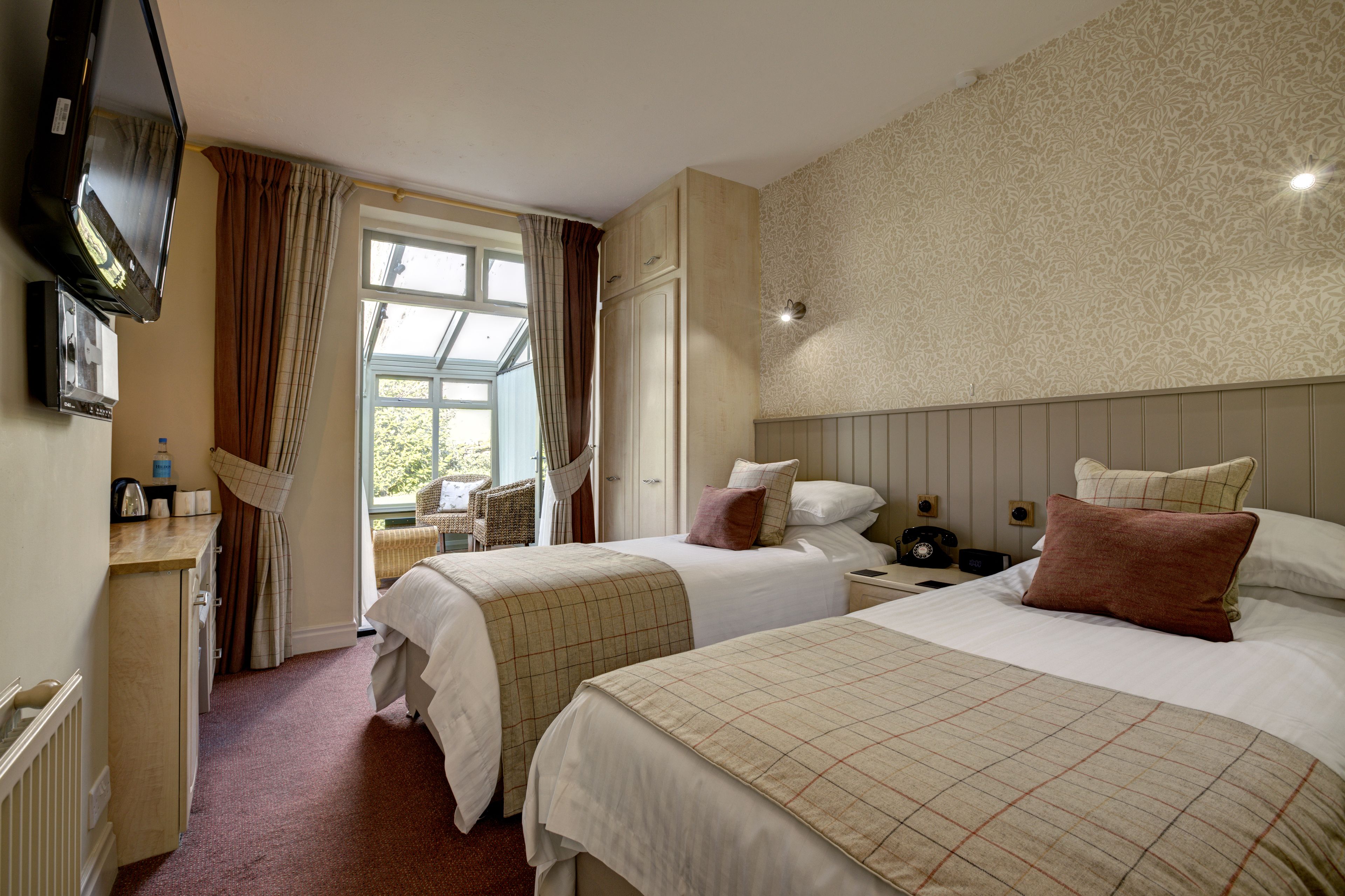 Habitació amb dos llits individuals, 2 llits individuals (Conservatory) | Roba de llit hipoal·lergògena, escriptori i cortines opaques 