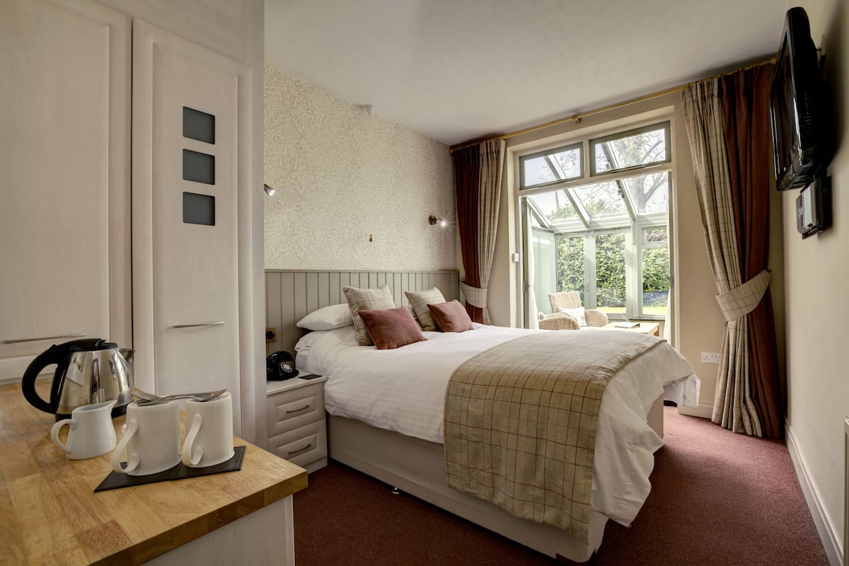 Tweepersoonskamer, 1 kingsize bed (Conservatory) | Hypoallergeen beddengoed, een bureau, verduisterende gordijnen