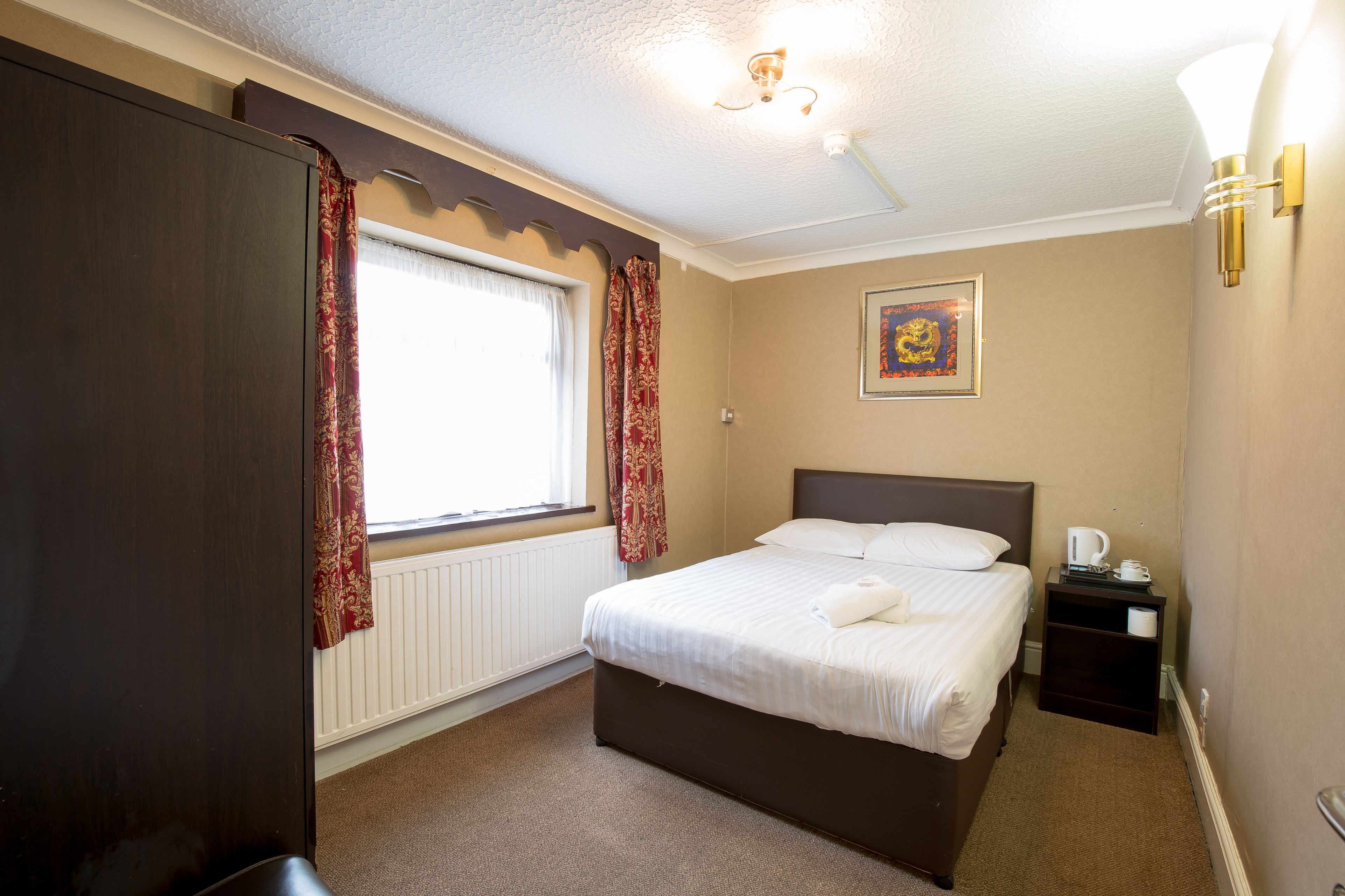 Doppelzimmer, Gemeinschaftsbad | Bügeleisen/Bügelbrett, kostenloses WLAN