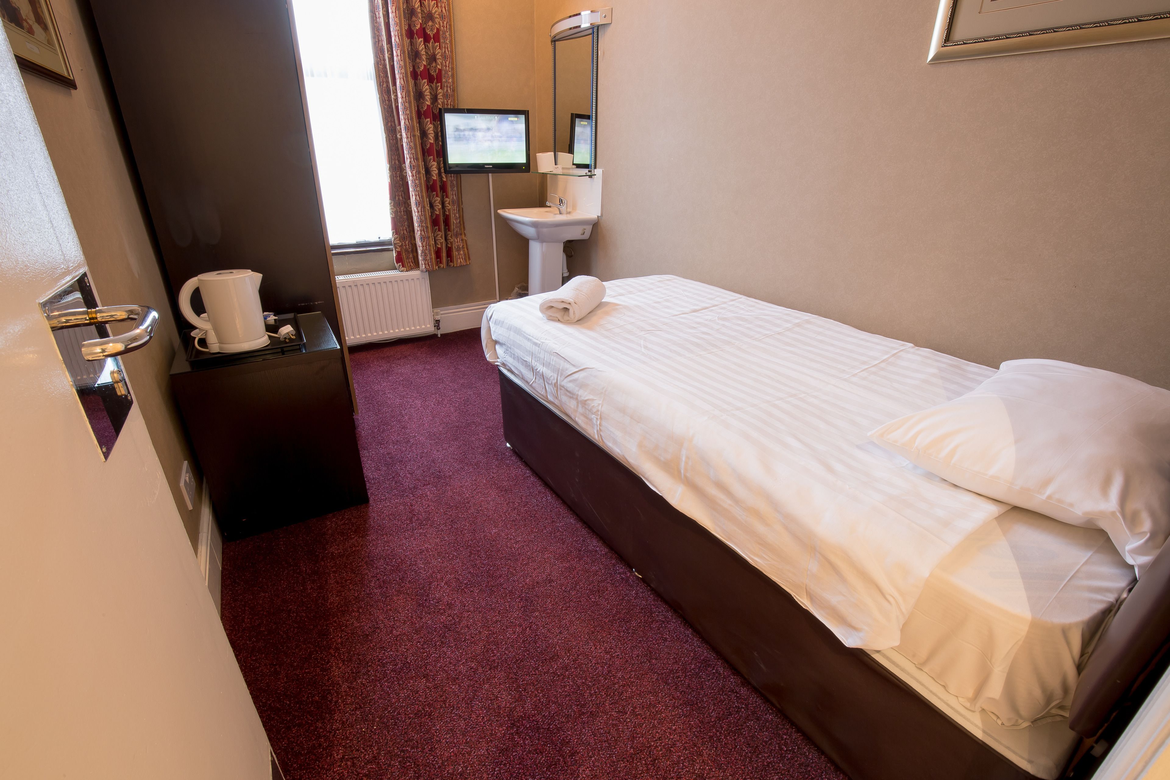 Einzelzimmer | Bügeleisen/Bügelbrett, kostenloses WLAN