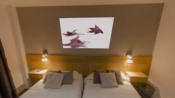 Double or Twin Room | 1 bedroom, in-room safe, desk, blackout drapes