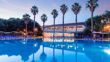 Seasonal outdoor pool, open 10:00 AM to 8:00 PM, pool umbrellas