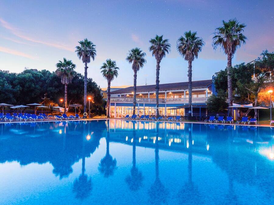 Seasonal outdoor pool, open 10:00 AM to 8:00 PM, pool umbrellas