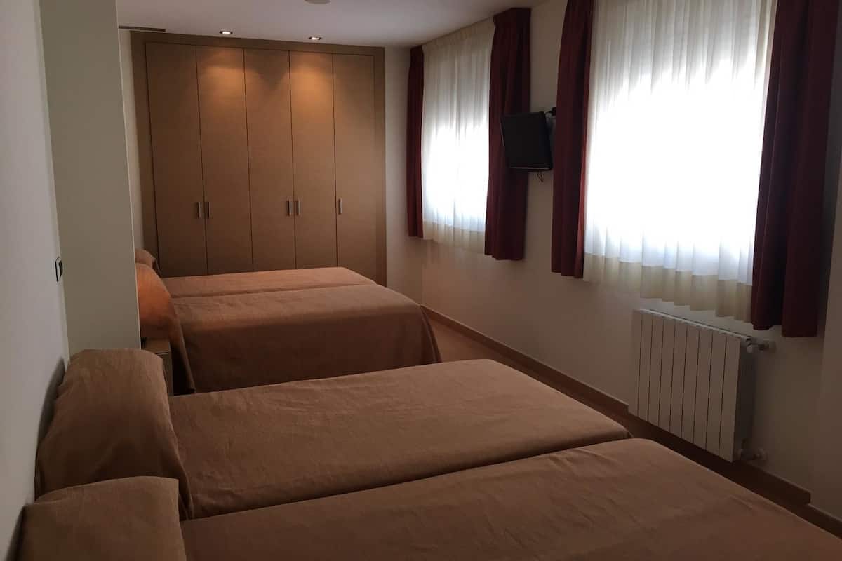 family room | desk, blackout curtains, soundproofing, free wifi