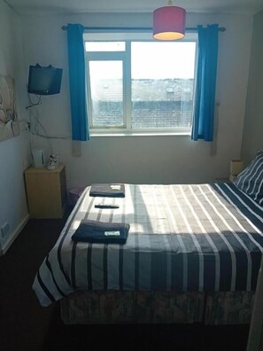 Laptop workspace, bed sheets - New Discovery (Blackpool)