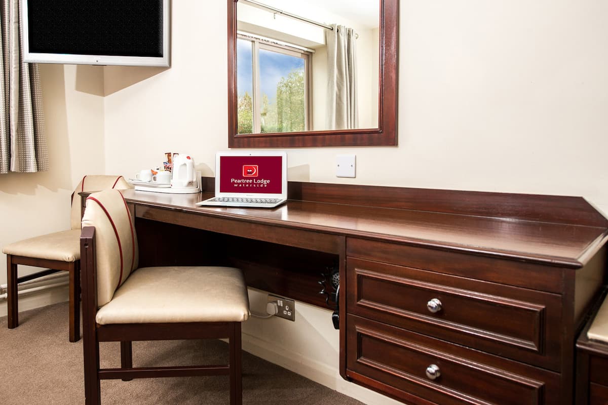 2 bedrooms, desk, laptop workspace, iron/ironing board