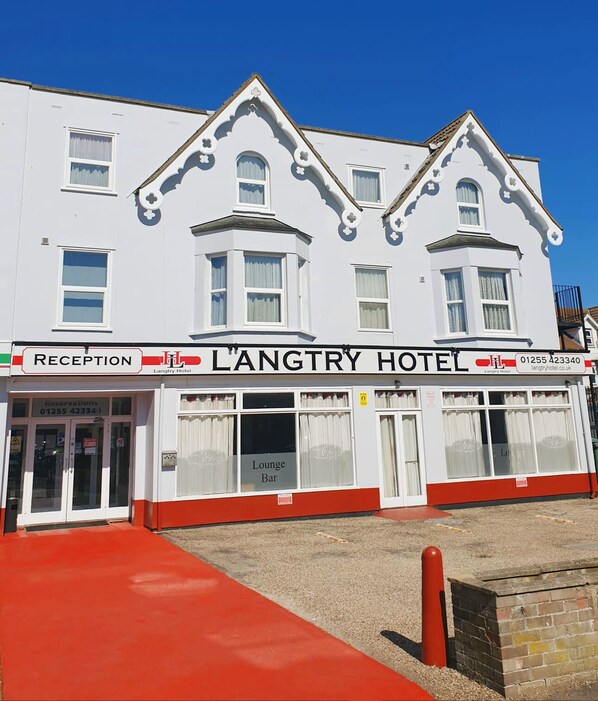 A two-story Langtry Hotel with a reception area, lounge bar, and a red carpet entrance. - Langtry Hotel (Clacton-on-Sea)