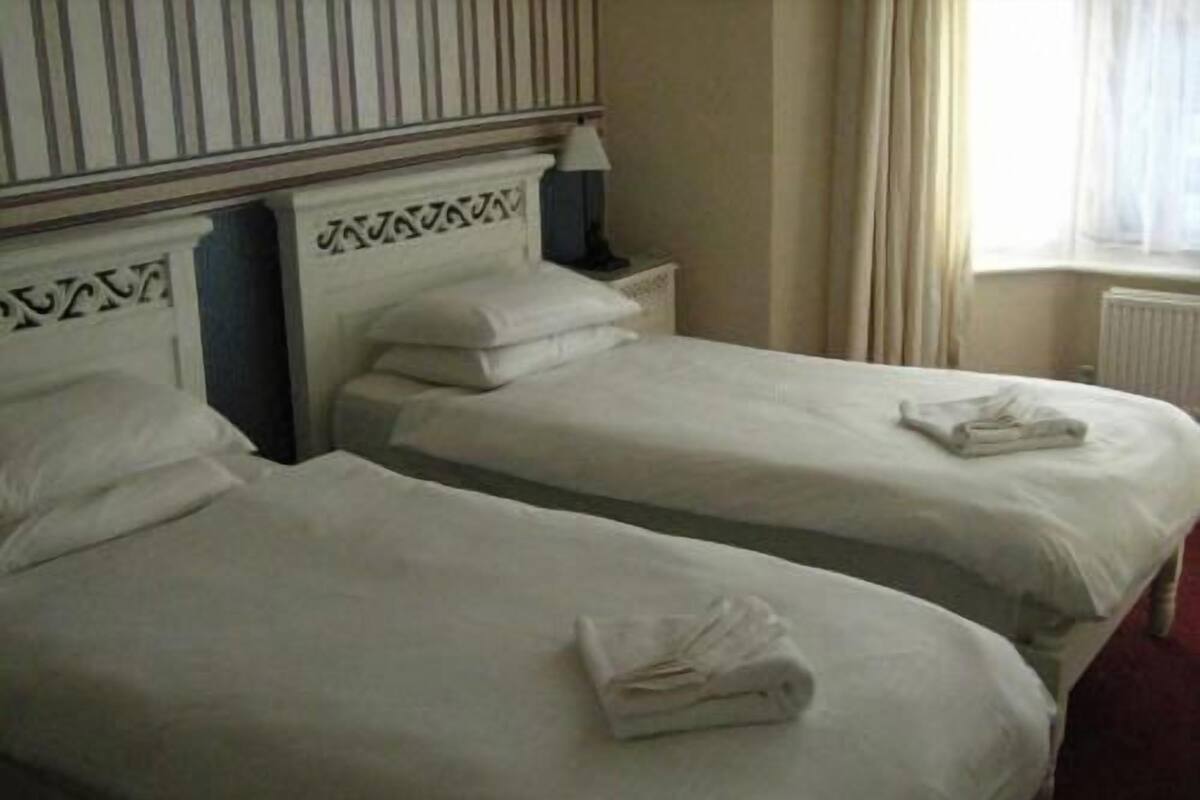 Desk, blackout curtains, free WiFi, bed sheets