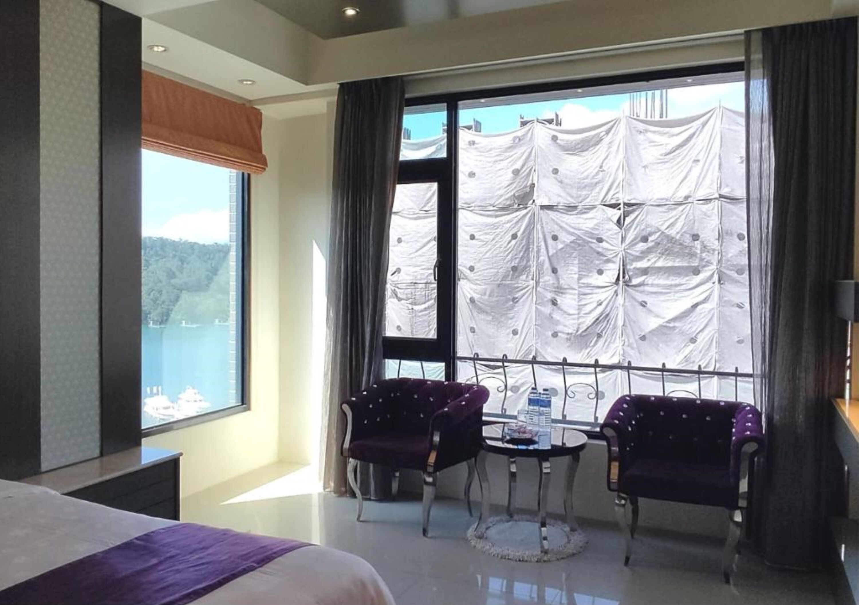 family room, partial lake view | premium bedding, minibar, desk, blackout curtains