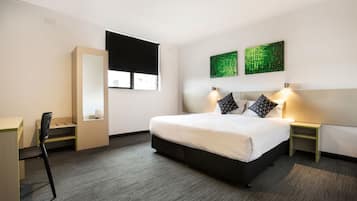 Studio King | Premium bedding, desk, iron/ironing board, cots/infant beds