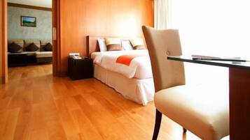 Suite, 1 King Bed, Balcony | Minibar, in-room safe, desk, soundproofing